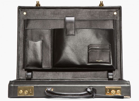 Black leather hardshell briefcase with gold tone