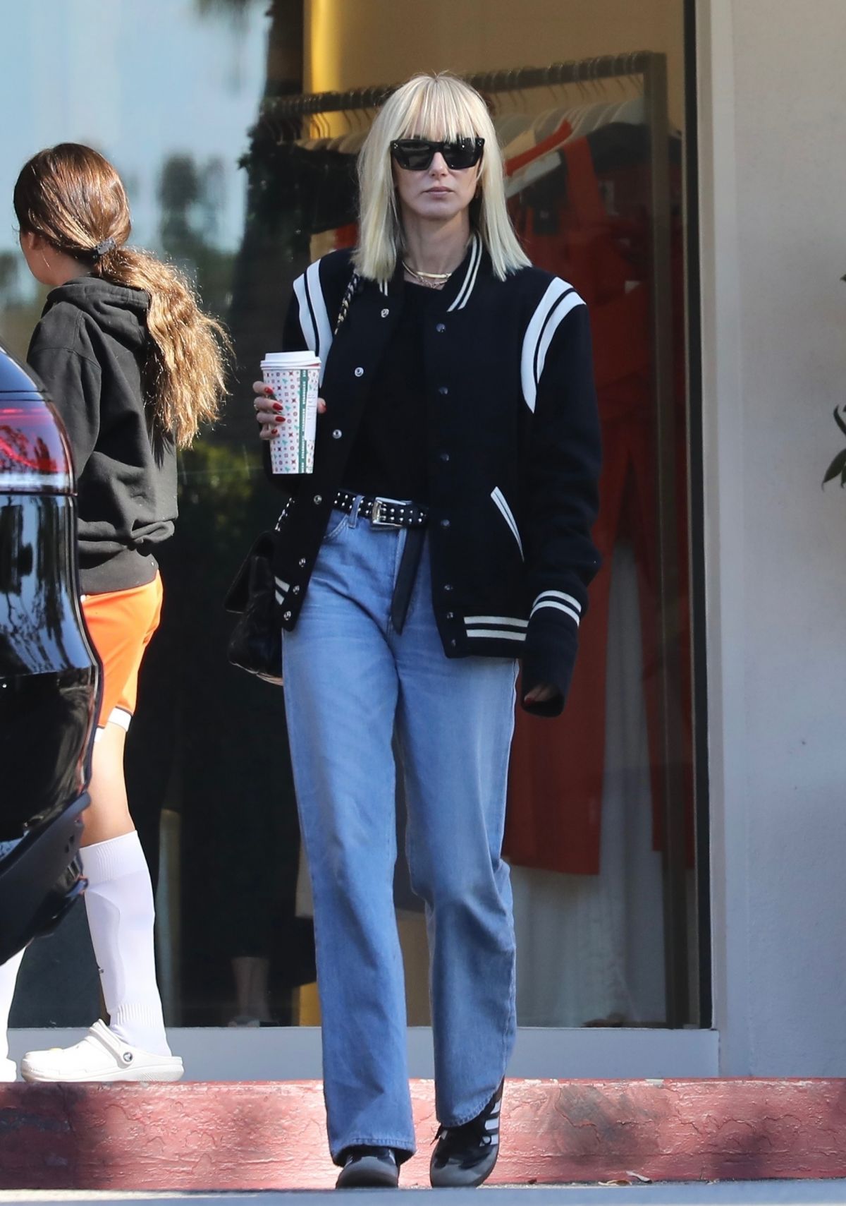 Kimberly Stewart grabbing coffee at Starbucks in Beverly Hills